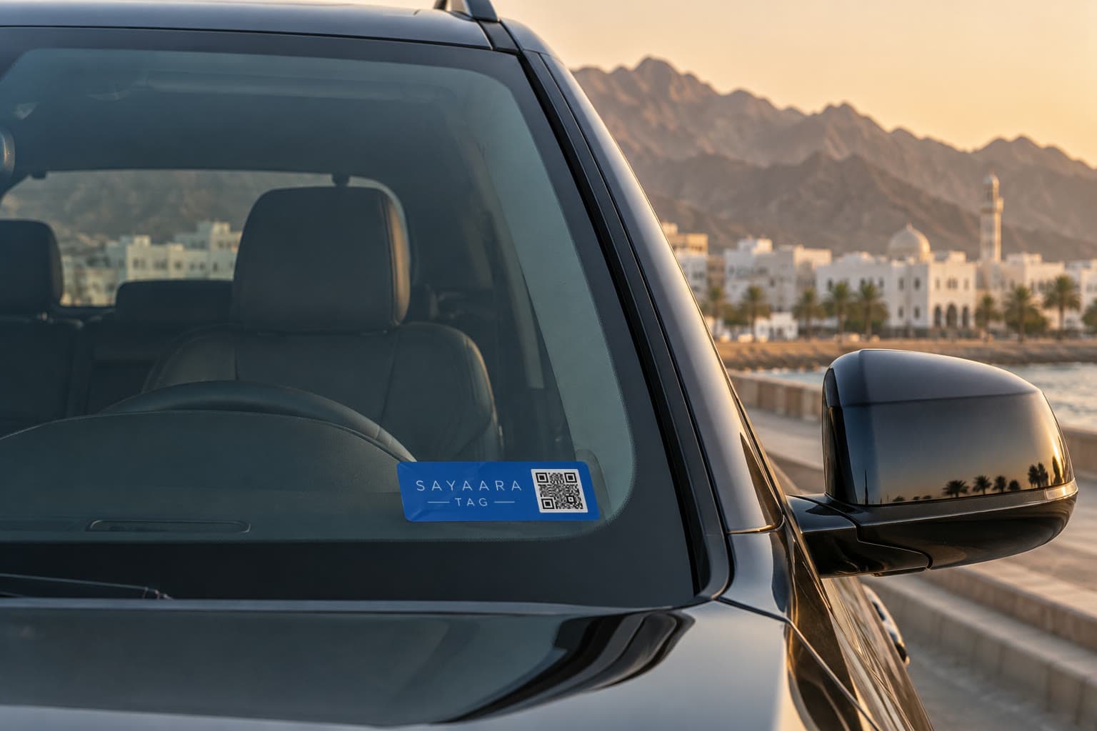 Sayaara Tag premium weatherproof QR tag mounted on a car windscreen